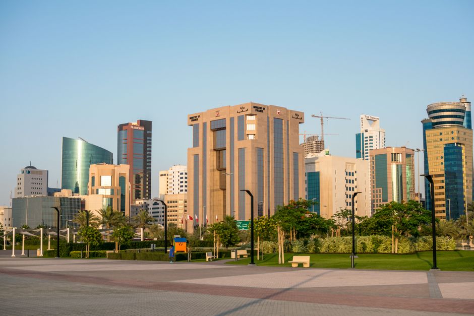 A Gulf skyline of modern diplomatic-quarter towers, the kind of backdrop against which the Doha mediation played out.