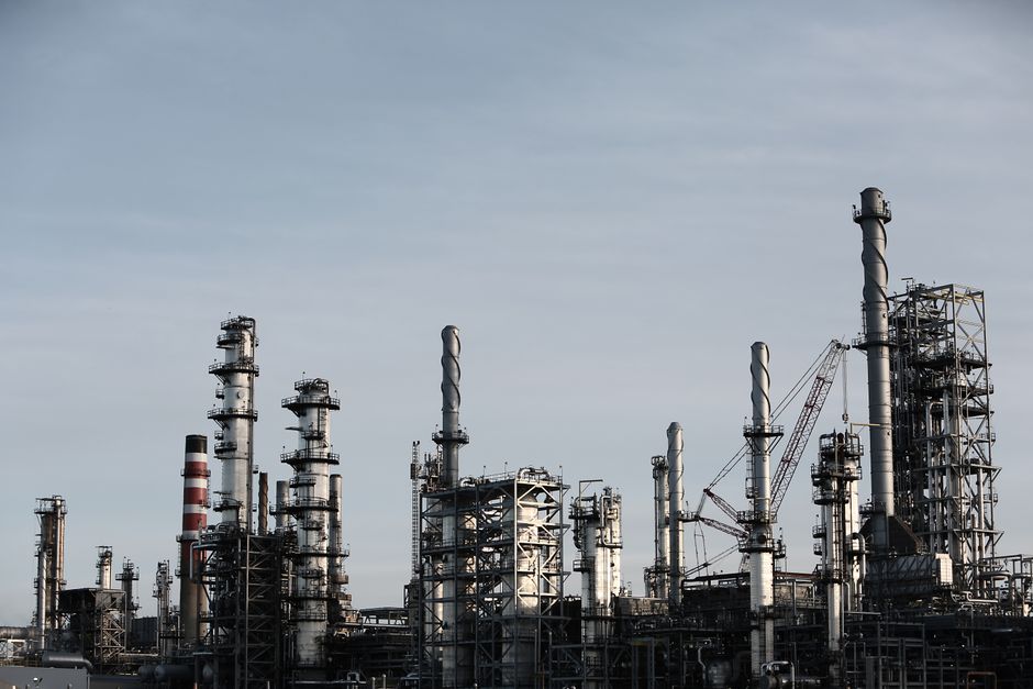 Industrial refinery complex with chimneys