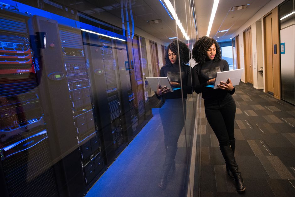 A technology worker monitoring a data-center environment