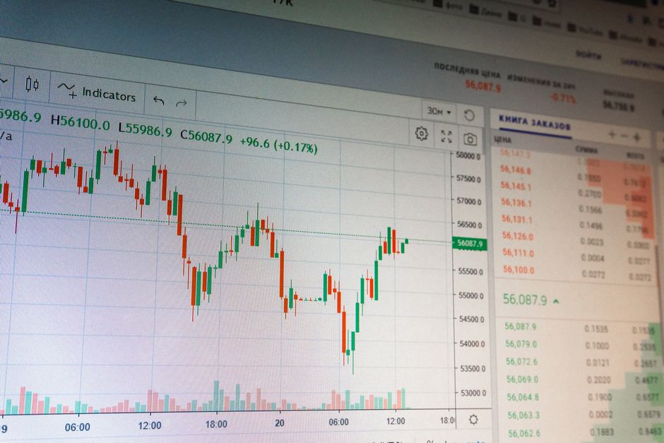 A screen of red and green price charts captures the kind of intraday volatility that accompanied the chip-stock rotation.