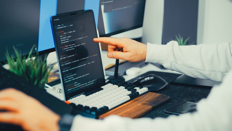 Software development and data infrastructure remain the monetization layer for AI deployment
