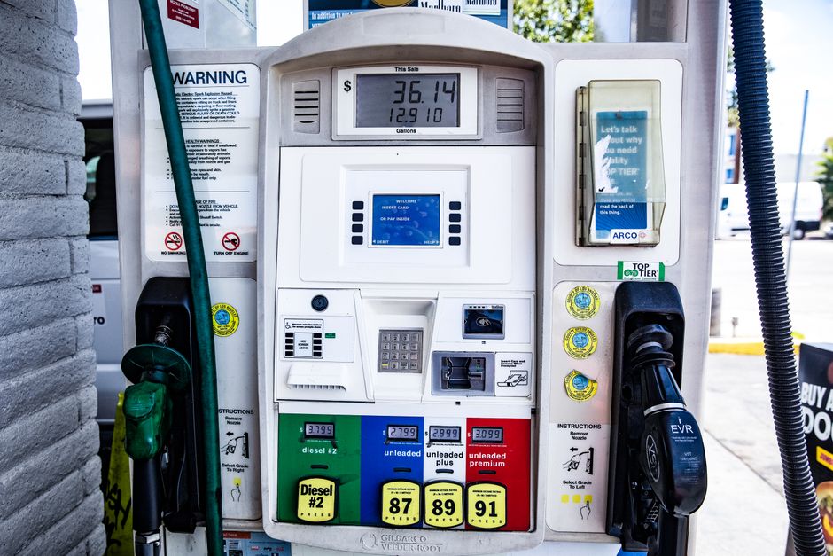 Close-up of a fuel pump showing gasoline and diesel options at a gas station