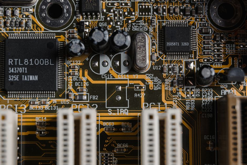 Detailed view of a motherboard with visible microchips and circuits