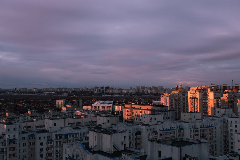 City skyline under dramatic clouds