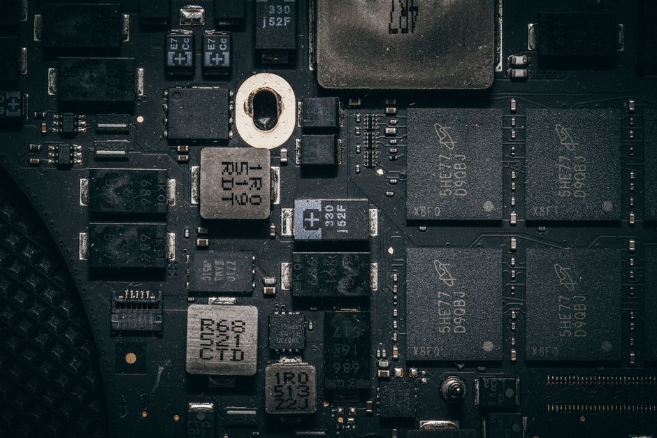 Detailed close-up of a computer circuit board highlighting electronic components and intricate design.