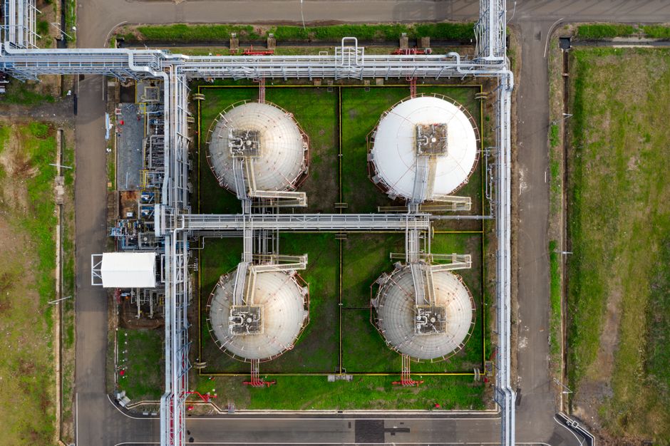 Industrial storage tanks represent the energy-supply channel through which Middle East tensions can reach oil, freight and markets.