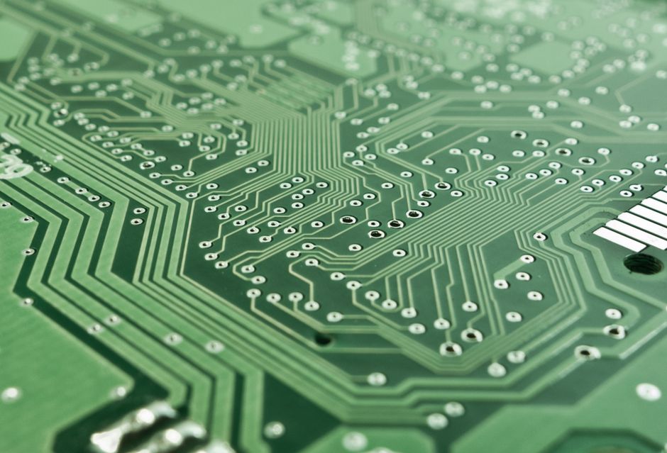 Green circuit board with complex patterns