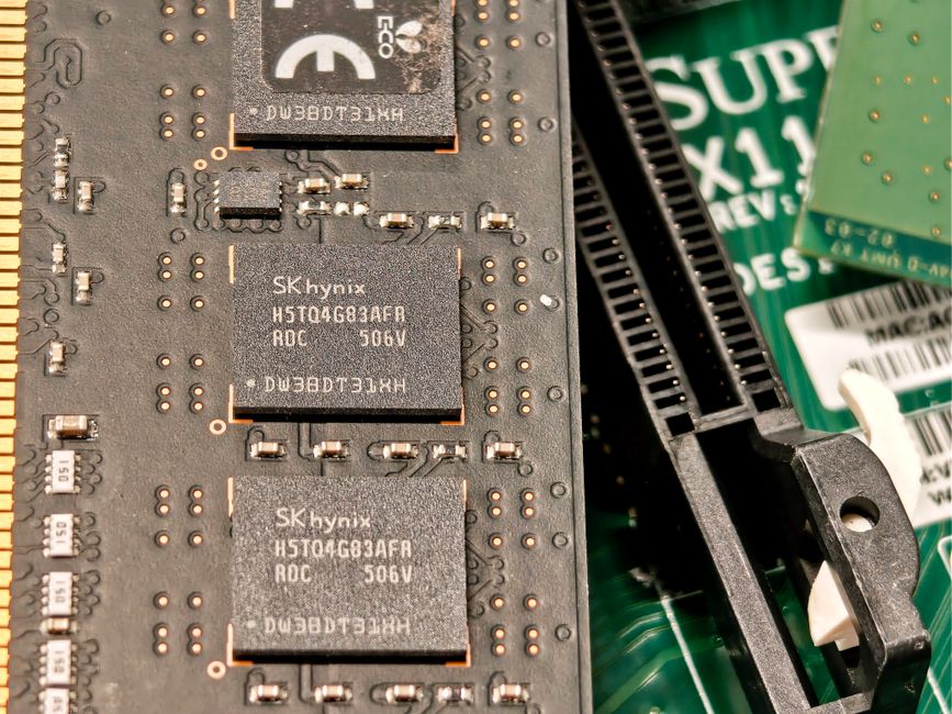 Close-up of computer RAM and circuit board components on a motherboard