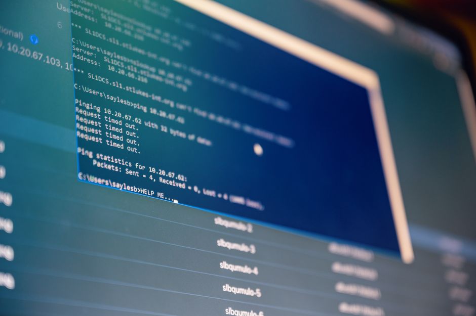 Blue computer screens with open data and software windows representing cloud technology demand
