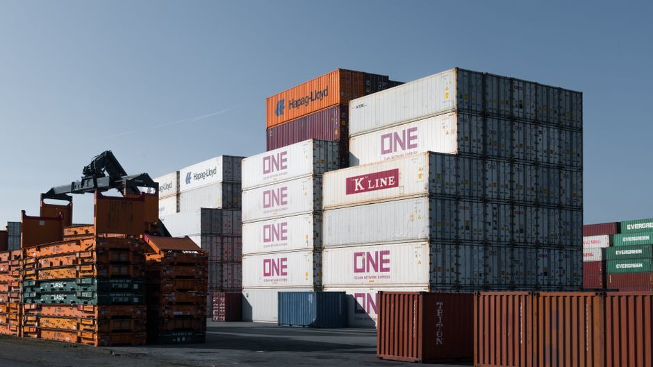 Shipping containers stacked at a port terminal