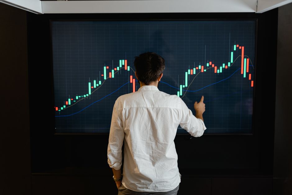 A market participant reviews equity-market data as issuers and investors assess a selective IPO window.