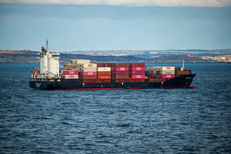 A container ship crossing an open sea