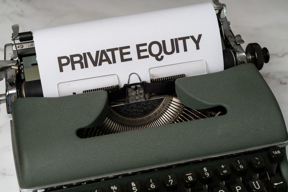 Close-up of a vintage typewriter with PRIVATE EQUITY printed on paper, representing the private secondaries market now competing with public listings.