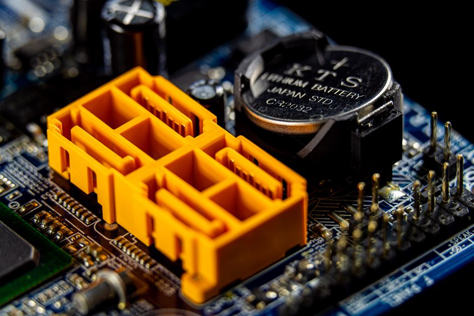 Close-up of a computer motherboard with visible electronic components and circuit traces.