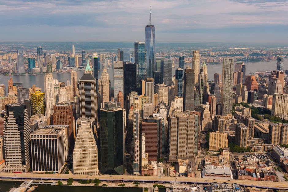 Aerial view of New York City skyline featuring skyscrapers.
